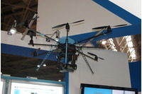 【防犯防災総合展】点検ヘリのIPカメラを利用したカメラ・モニタリングシステムを展示(NEXCO西日本) 画像